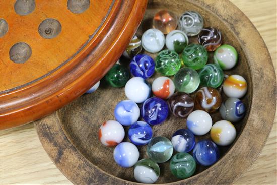 A treen solitaire board and marbles, a parquetry box and treen leaf tray